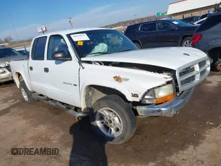 2000 Dodge Dakota Sport z VIN 1B7GL2AN5YS695474, wystawiony jako IAAI lot #38624575 z przebiegiem 94 328 mil mil oraz . Historia ofert i sprzedaży dostępna na DreamBid. Obrazek 1.