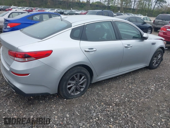 2020 Kia Optima LX z VIN 5XXGT4L38LG422703, wystawiony jako IAAI lot #39335033 z przebiegiem 73 037 mil mil oraz . Historia ofert i sprzedaży dostępna na DreamBid. Obrazek 4.