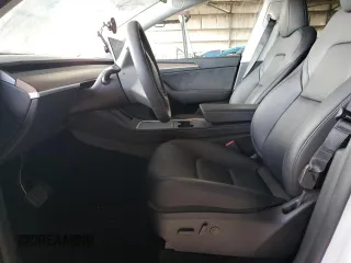2024 Tesla Model Y Long Range with VIN 7SAYGDEE1RF165311, listed as a Copart auction lot 51711665 with 15,190 mi miles and Salvage Title. Bid and sale history available at DreamBid. Image 7.