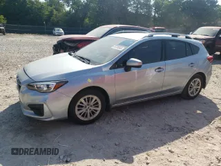 2017 Subaru Impreza Premium with VIN 4S3GTAD68H3709859, listed as a Copart auction lot 61233565 with 111,312 mi miles and Salvage title. Bid and sale history available at DreamBid. Image 1.