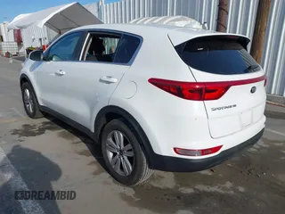 2019 Kia Sportage LX with VIN KNDPM3AC0K7535675, listed as a IAAI auction lot 41933482 with 118,012 mi miles and . Bid and sale history available at DreamBid. Image 3.