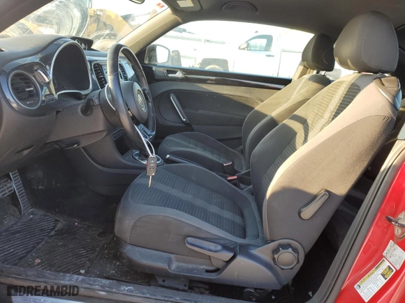2012 Volkswagen Beetle 2.0T Turbo w/Sun/Sound with VIN 3VWV67AT4CM665309, listed as a Copart auction lot 88842565 with 160,998 mi miles and Salvage Title. Bid and sale history available at carsss.com. Image 7.