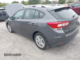 2018 Subaru Impreza Premium z VIN 4S3GTAD61J3703780, wystawiony jako IAAI lot #42081604 z przebiegiem 79 757 mil mil oraz . Historia ofert i sprzedaży dostępna na DreamBid. Obrazek 3.