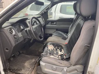 2014 Ford F-150 XL with VIN 1FTNF1CF5EKD79597, listed as a IAAI auction lot 41511800 with 100,758 mi miles. Bid and sale history available at carsss.com. Image 5.