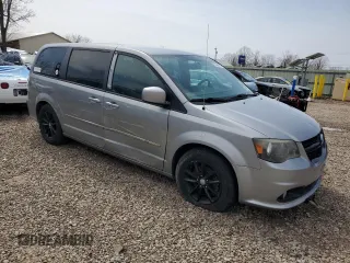 2014 Dodge Grand Caravan SXT with VIN 2C4RDGCG4ER114464, listed as a Copart auction lot 52480965 with 125,212 mi miles and Salvage Title. Bid and sale history available at DreamBid. Image 4.