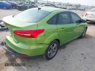 2018 Ford Focus SE z VIN 1FADP3FE5JL222542, wystawiony jako IAAI lot #42265608 z przebiegiem 107 397 mil mil oraz . Historia ofert i sprzedaży dostępna na DreamBid. Obrazek 4.