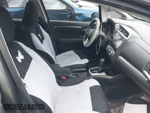 2015 Honda Fit EX-L with VIN 3HGGK5H82FM731732, listed as a IAAI auction lot 42164252 with 99,461 mi miles and . Bid and sale history available at DreamBid. Image 5.