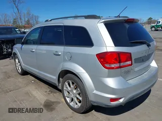 2014 Dodge Journey SXT z VIN 3C4PDCBG7ET227470, wystawiony jako IAAI lot #41843128 z przebiegiem 98 195 mil mil oraz . Historia ofert i sprzedaży dostępna na DreamBid. Obrazek 3.