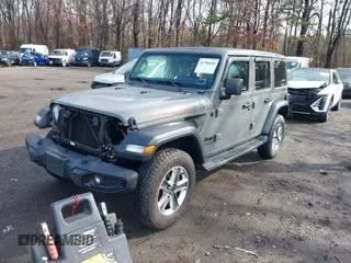 2021 Jeep Wrangler Unlimited Willys Sport with VIN 1C4HJXDGXMW767633, listed as a IAAI auction lot 41700168 with 37,994 mi miles and . Bid and sale history available at DreamBid. Image 2.