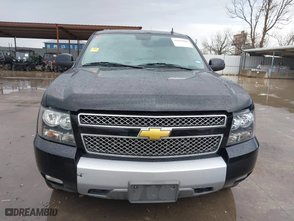 2013 Chevrolet Suburban LT with VIN 1GNSKJE71DR308480, listed as a IAAI auction lot 41695090 with 129,000 mi miles. Bid and sale history available at carsss.com. Image 12.