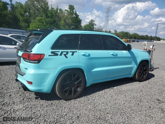 2015 Jeep Grand Cherokee SRT with VIN 1C4RJFDJXFC861588, listed as a Copart auction lot 51301235 with 35,927 mi miles and Clean Title. Bid and sale history available at carsss.com. Image 3.