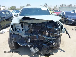 2022 Toyota Tacoma SR with VIN 3TYCZ5AN0NT104300, listed as a IAAI auction lot 42652503 with 18,071 mi miles and . Bid and sale history available at DreamBid. Image 13.