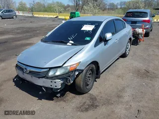 2012 Honda Civic Sdn LX with VIN 2HGFB2F56CH314403, listed as a IAAI auction lot 42079018 with 103,153 mi miles. Bid and sale history available at carsss.com. Image 2.