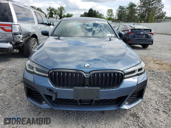 2023 BMW 5 Series M550i xDrive z VIN WBA13BK02PCN82953, wystawiony jako Copart lot #68124264 z przebiegiem 10 010 mil mil oraz Szkoda całkowita • Salvage title. Historia ofert i sprzedaży dostępna na DreamBid. Obrazek 5.