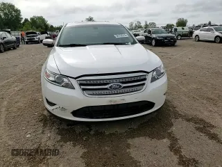 2012 Ford Taurus SEL z VIN 1FAHP2EW8CG138653, wystawiony jako Copart lot #56750215 z przebiegiem 159 631 mil mil oraz Szkoda całkowita • Salvage title. Historia ofert i sprzedaży dostępna na DreamBid. Obrazek 13.