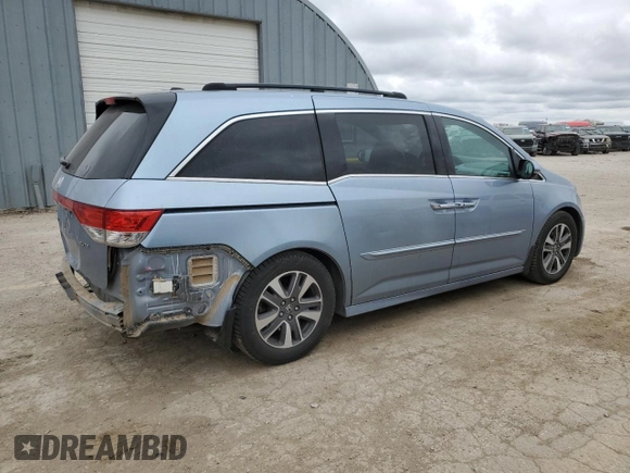 2014 Honda Odyssey Touring with VIN 5FNRL5H90EB007182, listed as a Copart auction lot 51152775 with 152,483 mi miles and Salvage title. Bid and sale history available at DreamBid. Image 3.