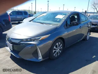2022 Toyota Prius Prime LE with VIN JTDKAMFP0N3210606, listed as a IAAI auction lot 41674546 with NaN miles. Bid and sale history available at carsss.com. Image 18.