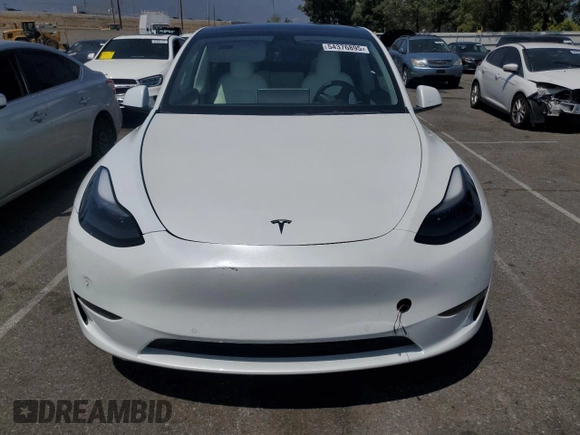 2022 Tesla Model Y Performance with VIN 7SAYGDEFXNF407340, listed as a Copart auction lot 54376895 with 56,709 mi miles and Salvage Title. Bid and sale history available at DreamBid. Image 5.