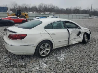 2013 Volkswagen CC Sport Plus z VIN WVWBP7AN1DE555927, wystawiony jako Copart lot #49028445 z przebiegiem 132 109 mil mil oraz Szkody całkowita. Historia ofert i sprzedaży dostępna na DreamBid. Obrazek 3.