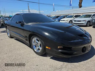 2002 Pontiac Firebird Formula z VIN 2G2FV22G222170769, wystawiony jako Copart lot #56757455 z przebiegiem 120 282 mil mil oraz Tytuł czysty. Historia ofert i sprzedaży dostępna na DreamBid. Obrazek 1.