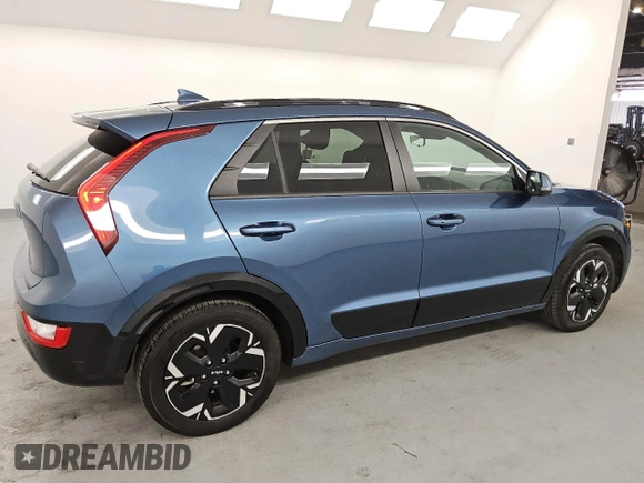 2023 Kia Niro Wind with VIN KNDCR3L1XP5036557, listed as a Copart auction lot 52805055 with 56,357 mi miles and Salvage Title. Bid and sale history available at carsss.com. Image 3.