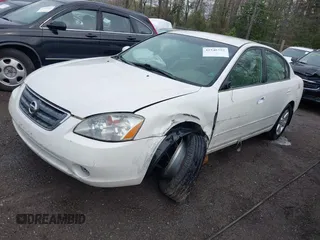 2002 Nissan Altima S with VIN 1N4AL11D72C138368, listed as a IAAI auction lot 41948552 with 242,060 mi miles. Bid and sale history available at carsss.com. Image 17.