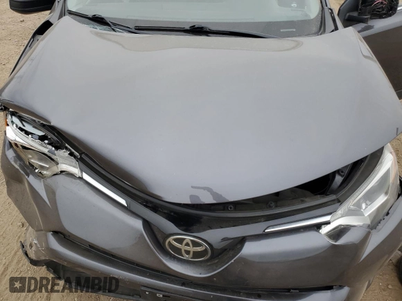 2018 Toyota RAV4 LE with VIN JTMBFREVXJJ226235, listed as a Copart auction lot 52299325 with 102,652 mi miles and Salvage Title. Bid and sale history available at carsss.com. Image 13.
