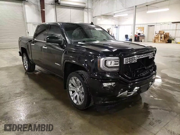 2017 GMC Sierra 1500 Denali z VIN 3GTU2PEJ7HG243799, wystawiony jako Copart lot #53297915 z przebiegiem 98 580 mil mil oraz Szkoda całkowita • Salvage title. Historia ofert i sprzedaży dostępna na DreamBid. Obrazek 11.