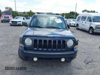 2014 Jeep Patriot Latitude with VIN 1C4NJPFA4ED604145, listed as a IAAI auction lot 42091619 with 81,119 mi miles and . Bid and sale history available at carsss.com. Image 13.
