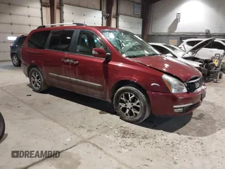 2014 Kia Sedona EX with VIN KNDMH4C74E6547870, listed as a IAAI auction lot 41403040 with 156,005 mi miles. Bid and sale history available at carsss.com. Image 1.