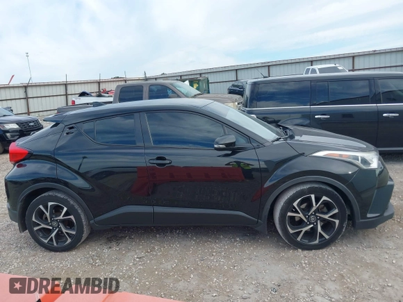 2018 Toyota C-HR XLE z VIN NMTKHMBX8JR008430, wystawiony jako IAAI lot #42635658 z przebiegiem 176 462 mil mil oraz . Historia ofert i sprzedaży dostępna na DreamBid. Obrazek 13.