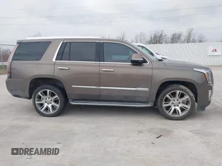 2015 Cadillac Escalade Luxury z VIN 1GYS3MKJ9FR725818, wystawiony jako IAAI lot #41596731 z przebiegiem 224 246 mil mil oraz . Historia ofert i sprzedaży dostępna na DreamBid. Obrazek 13.