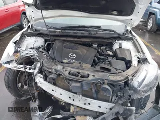 2016 Mazda CX-5 Grand Touring with VIN JM3KE4DY0G0705691, listed as a IAAI auction lot 40880798 with 130,624 mi miles. Bid and sale history available at carsss.com. Image 10.