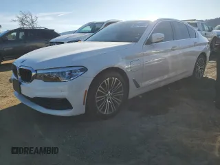 2020 BMW 5 Series 530e with VIN WBAJA9C00LCD30709, listed as a Copart auction lot 86218294 with 154,841 mi miles and Salvage Title. Bid and sale history available at carsss.com. Image 1.