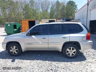 2005 GMC Envoy SLE with VIN 1GKDS13S652390259, listed as a IAAI auction lot 41825258 with 162,172 mi miles. Bid and sale history available at carsss.com. Image 14.