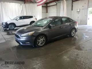 2015 Ford Focus SE with VIN 1FADP3F29FL310622, listed as a Copart auction lot 63591065 with 119,957 mi miles and Salvage title. Bid and sale history available at DreamBid. Image 1.