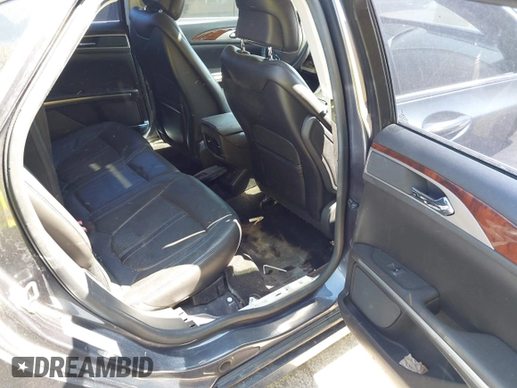 2014 Lincoln MKZ with VIN 3LN6L2GK9ER818561, listed as a IAAI auction lot 42063387 with 143,803 mi miles. Bid and sale history available at carsss.com. Image 8.