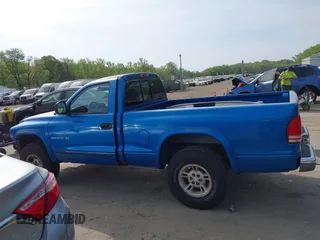1999 Dodge Dakota z VIN 1B7GG26X3XS142920, wystawiony jako IAAI lot #42116843 z przebiegiem 300 139 mil mil oraz . Historia ofert i sprzedaży dostępna na DreamBid. Obrazek 14.