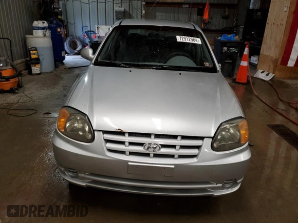 2004 Hyundai Accent GL with VIN KMHCG45C04U544804, listed as a Copart auction lot 72912984 with 121,178 mi miles and Salvage Title. Bid and sale history available at carsss.com. Image 5.