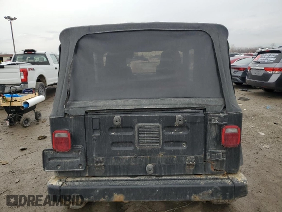 2003 Jeep Wrangler Sport with VIN 1J4FA49S33P345306, listed as a Copart auction lot 46899265 with 143,858 mi miles and Clean Title. Bid and sale history available at carsss.com. Image 6.
