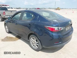 2018 Toyota Yaris with VIN 3MYDLBYV7JY305900, listed as a IAAI auction lot 42052167 with 128,876 mi miles and . Bid and sale history available at DreamBid. Image 3.