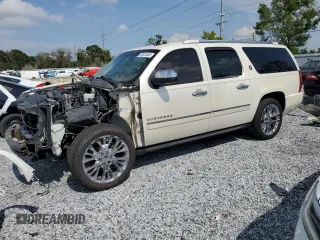 2010 Chevrolet Suburban LTZ with VIN 1GNUCKE03AR288355, listed as a Copart auction lot 58833465 with 216,267 mi miles and Salvage title. Bid and sale history available at DreamBid. Image 1.
