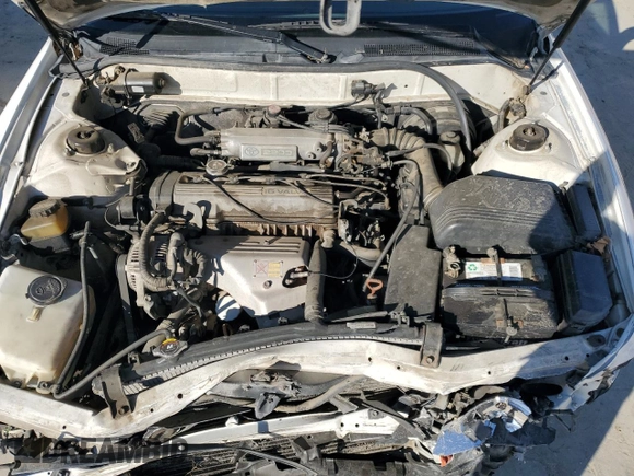 1992 Toyota Camry LE z VIN 4T1SK12E8NU044387, wystawiony jako Copart lot #43195915 z przebiegiem 279 199 mil mil oraz Szkoda całkowita • Salvage title. Historia ofert i sprzedaży dostępna na DreamBid. Obrazek 13.