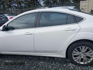 2009 Mazda 6 i Touring with VIN 1YVHP82A195M01537, listed as a IAAI auction lot 41471542 with 180,175 mi miles and . Bid and sale history available at carsss.com. Image 14.