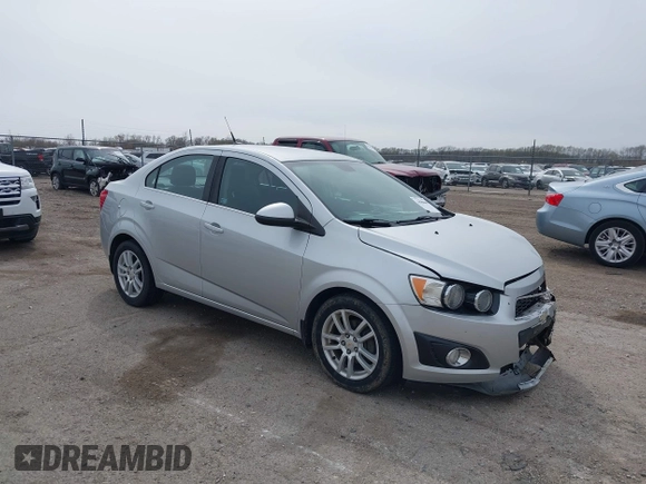 2012 Chevrolet Sonic LT with VIN 1G1JC5SHXC4170853, listed as a IAAI auction lot 41941069 with 130,917 mi miles and . Bid and sale history available at DreamBid. Image 1.