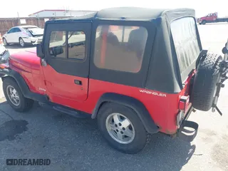 1995 Jeep Wrangler S with VIN 1J4FY19P5SP286845, listed as a IAAI auction lot 42028886 with 155,841 mi miles. Bid and sale history available at carsss.com. Image 3.