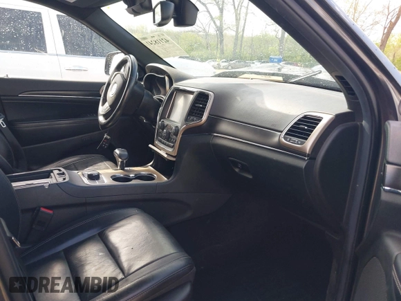 2014 Jeep Grand Cherokee Limited with VIN 1C4RJFBT4EC349957, listed as a IAAI auction lot 42118241 with 127,168 mi miles and . Bid and sale history available at DreamBid. Image 5.