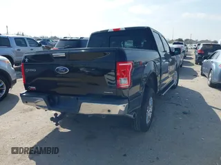 2015 Ford F-150 XLT with VIN 1FTEW1EF4FKD15422, listed as a IAAI auction lot 41593431 with 112,102 mi miles. Bid and sale history available at carsss.com. Image 4.