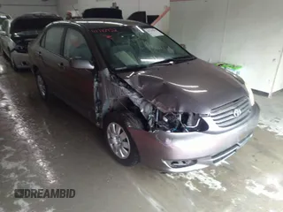 2004 Toyota Corolla CE with VIN 1NXBR32E14Z204650, listed as a IAAI auction lot 41710452 with 168,099 mi miles. Bid and sale history available at carsss.com. Image 1.