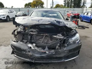 2018 BMW 7 Series 740i with VIN WBA7E2C59JB216290, listed as a Copart auction lot 89082215 with 56,020 mi miles and Salvage Title. Bid and sale history available at carsss.com. Image 5.